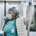 Nurse passenger riding train