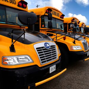 yellow school bus on road during daytime