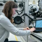 Female electronics engineer runs vehicle tests