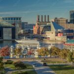 OCTOBER 28, 2016 - Baltimore Inner Harbor late afternoon lighting of ships and skyline, Baltimore, Maryland, shot from Federal Park Hill