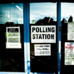 Polling station sign door