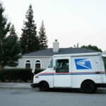white and blue van on road during daytime