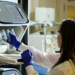 DNA Genotyping and Sequencing. Technician prepares for a viral whole-genome sequencing experiment at the Cancer Genomics Research Laboratory, part of the National Cancer Institute's Division of Cancer Epidemiology and Genetics (DCEG).