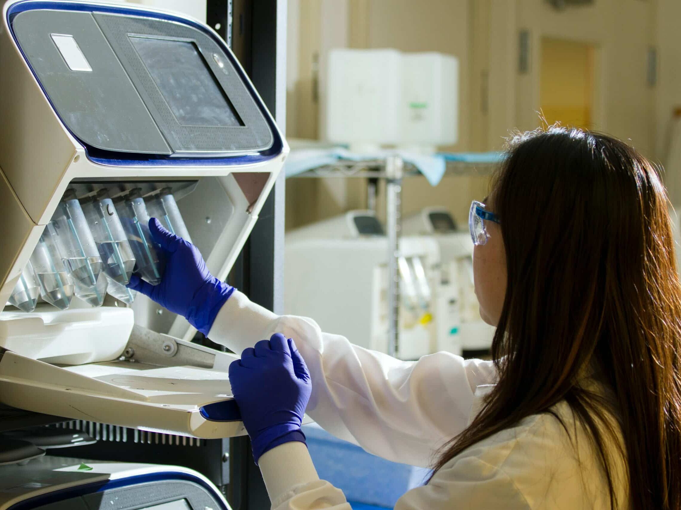 DNA Genotyping and Sequencing. Technician prepares for a viral whole-genome sequencing experiment at the Cancer Genomics Research Laboratory, part of the National Cancer Institute's Division of Cancer Epidemiology and Genetics (DCEG).