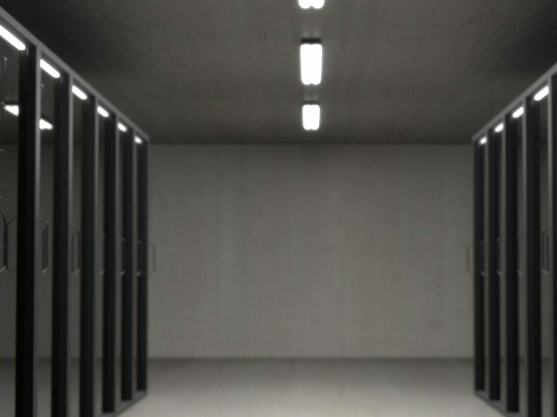 Black server racks on a room