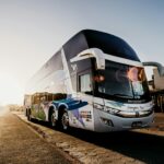 gray and black bus parked during daytime