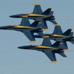 The Blue Angels are well known for flying extremely tight formations, and this is an excellent example. Taken on a hot and steamy day at Joint Base Andrews air show - that’s where they keep Air Force One.