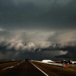 gray asphalt road under gray clouds