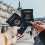 person holding passports