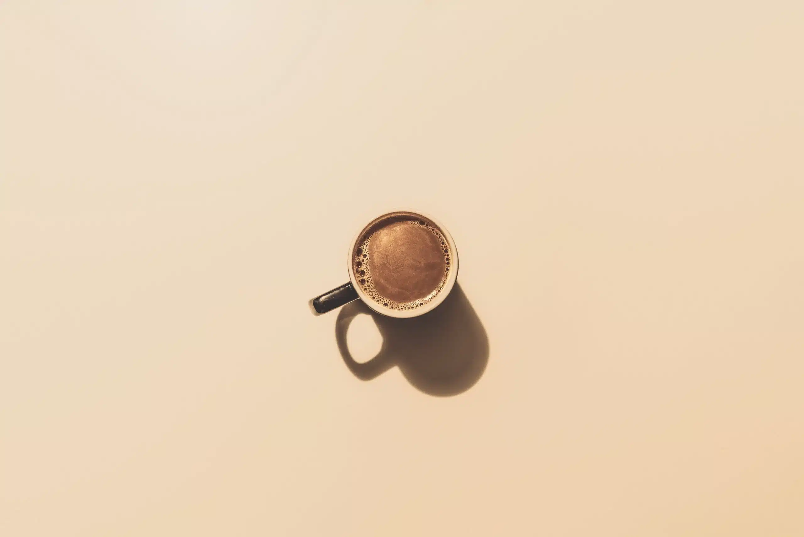 brown ceramic teacup